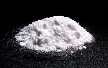 AM-2201 synthetic cannabinoid displayed on table